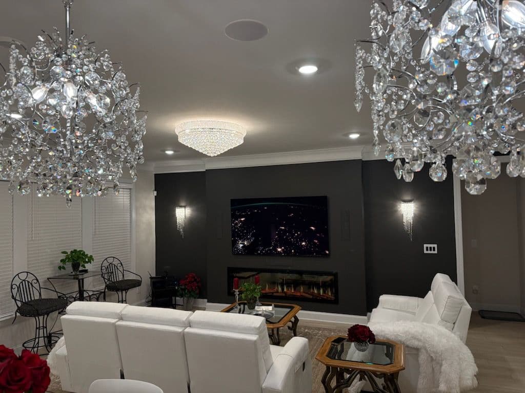 Project Crystal Chandeliers and Sconces Installed in a Living Room image