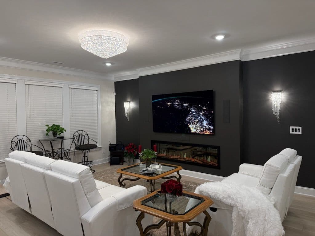 Gallery photos for Crystal Chandeliers and Sconces Installed in a Living Room: Image #1