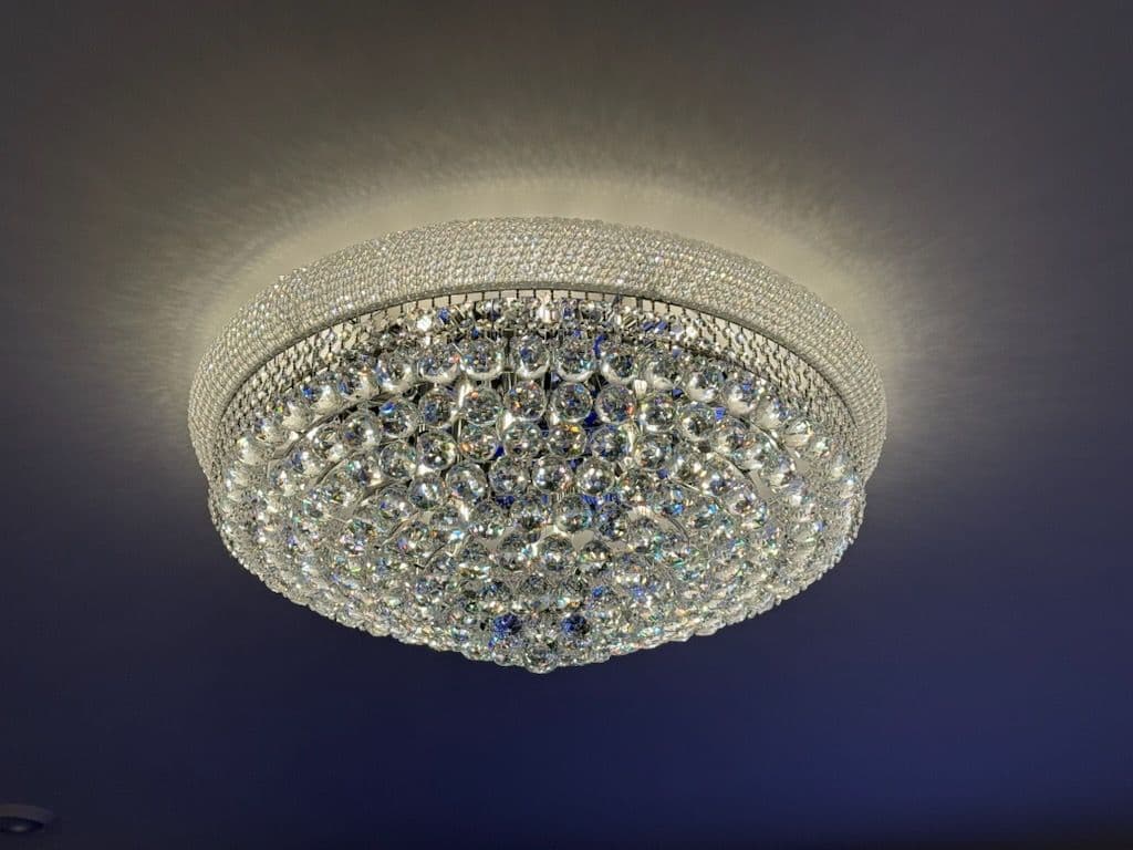 Gallery photos for Crystal Chandeliers and Sconces Installed in a Living Room: Image #3
